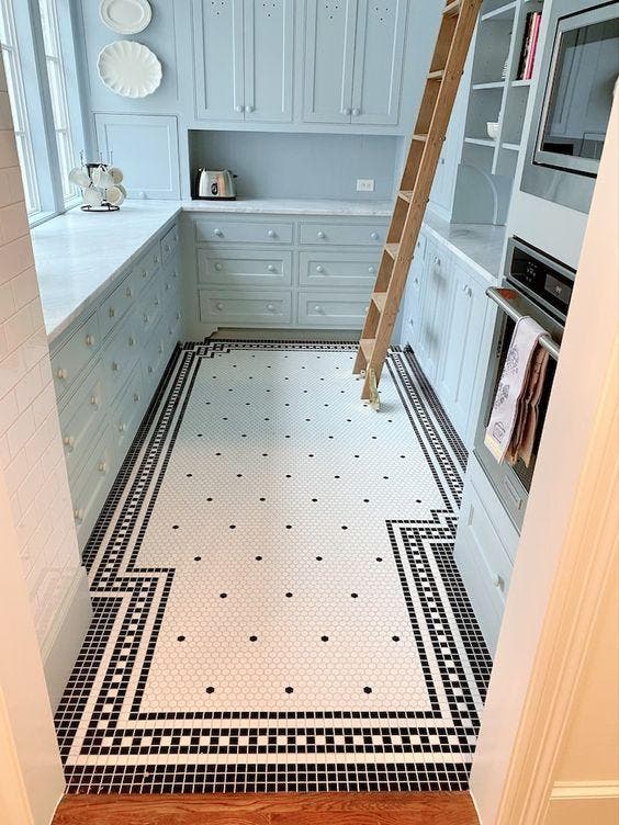 A kitchen with pennies on the floor