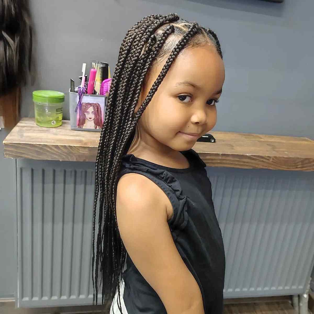 Coiffure pour filles avec box braids sur cheveux afros