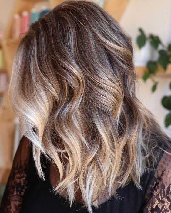 Balayage blond sur cheveux bruns