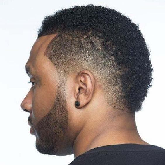 Faux hawk bouclé avec burst fade