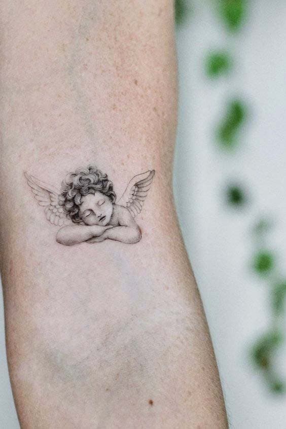 Petit tatouage Ange