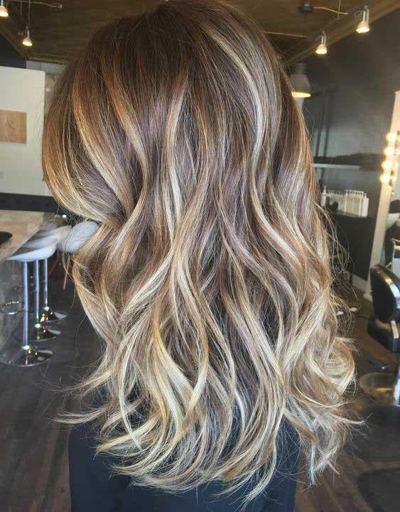 Reflets caramel et blond pour cheveux bruns