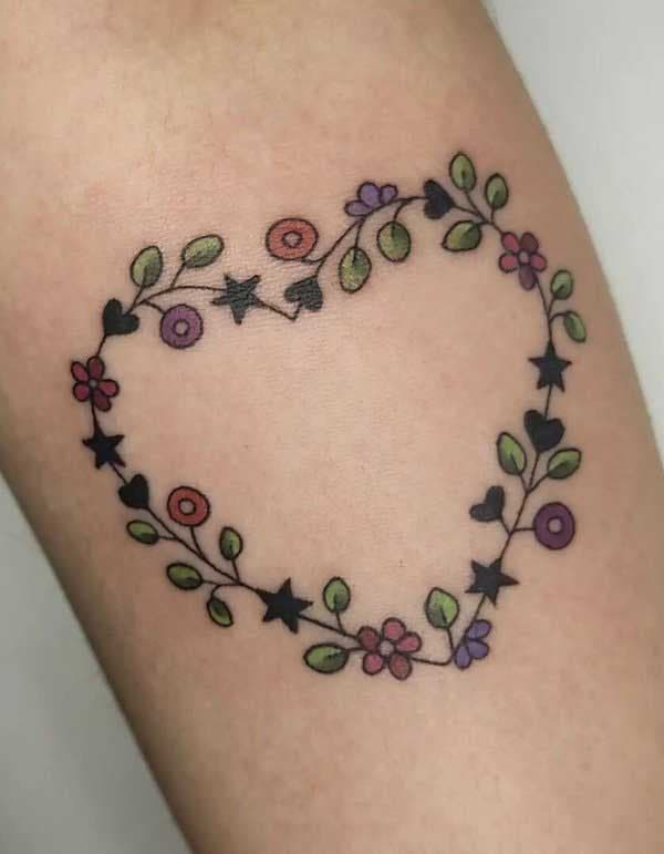 Tatouage coeur fleuri