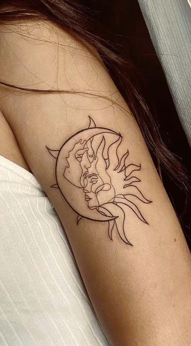 Tatouage soleil mandala sur le bras