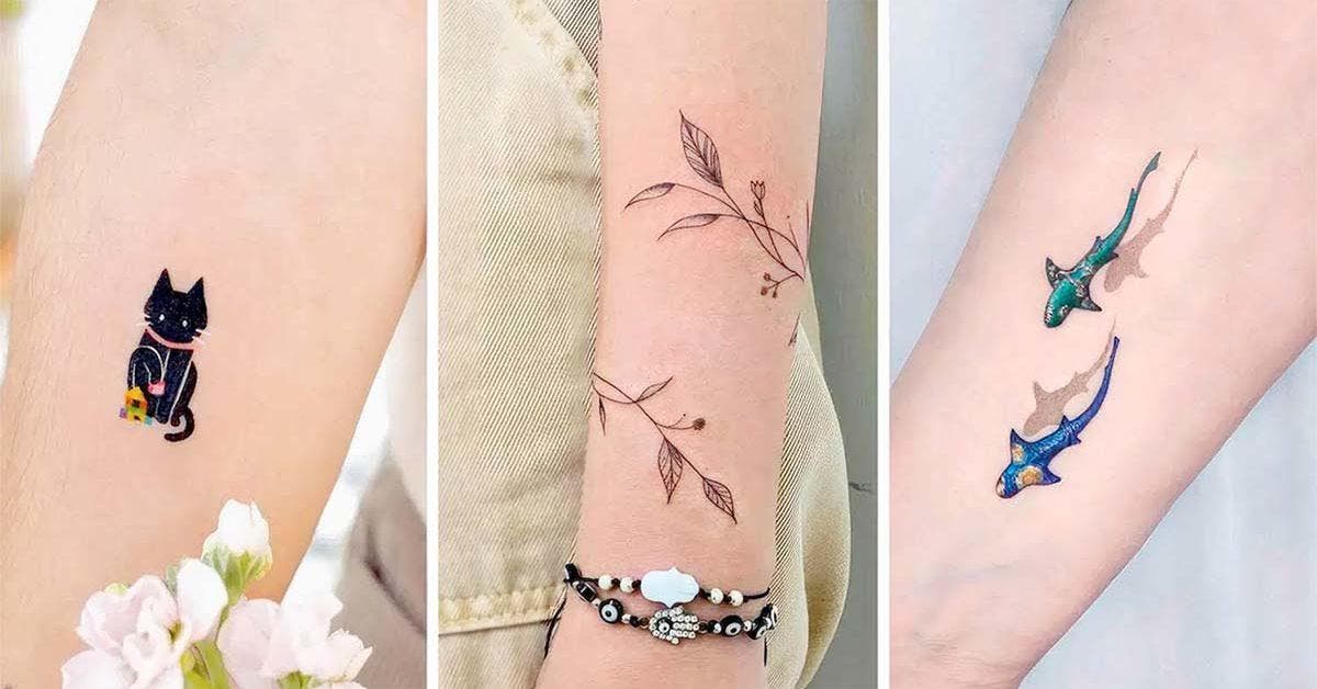 Tatouage Montre Gousset entourée de roses sur avant bras