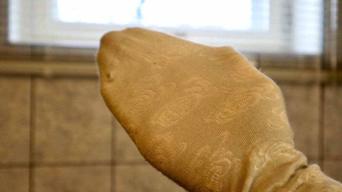 Turn an old sock into a cleaning glove