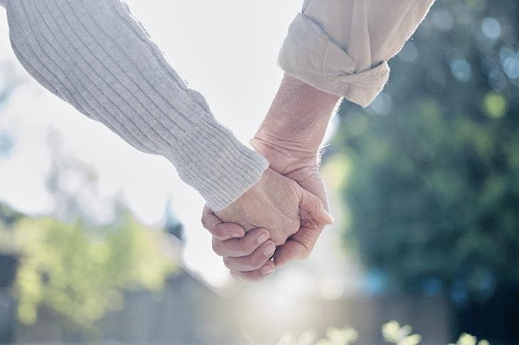 A couple holding hands