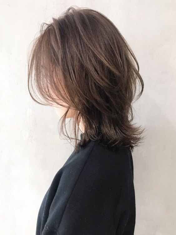 Wolf cut mi-longue sur cheveux fins mi-longs