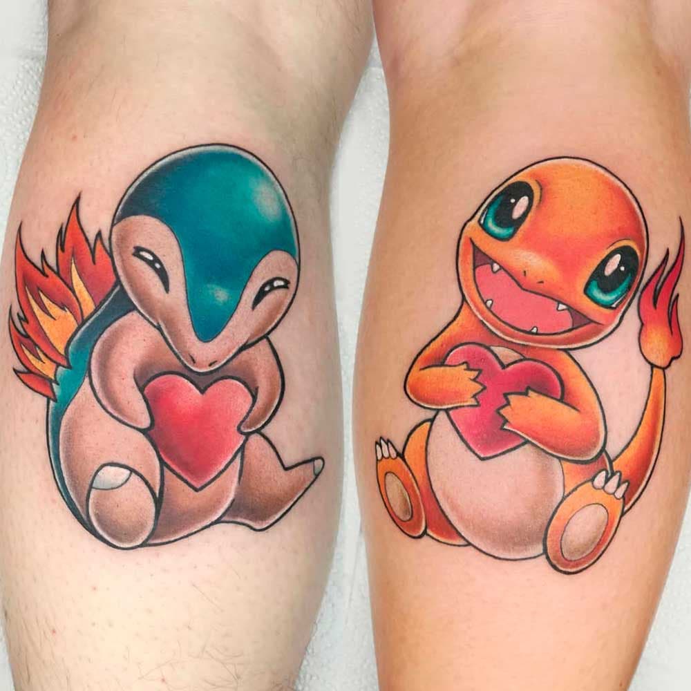 Deux tatouages représentant deux pokémon feu