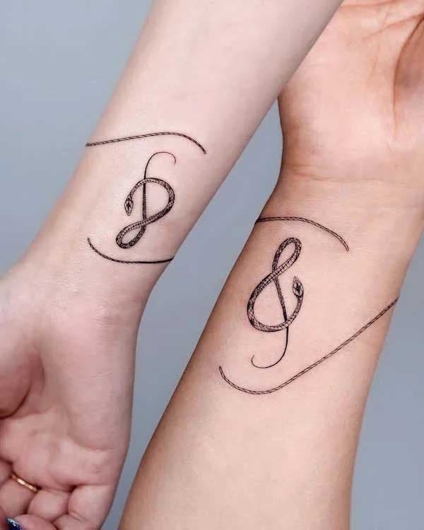 Tatouages notes de musique en serpents