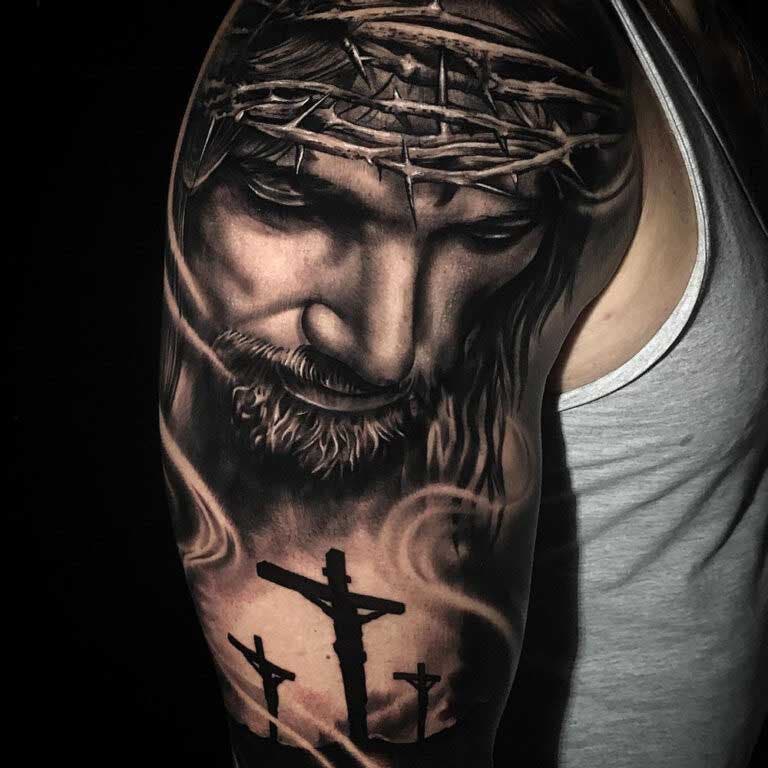 Tatouage de Jésus-Christ sur le bras 