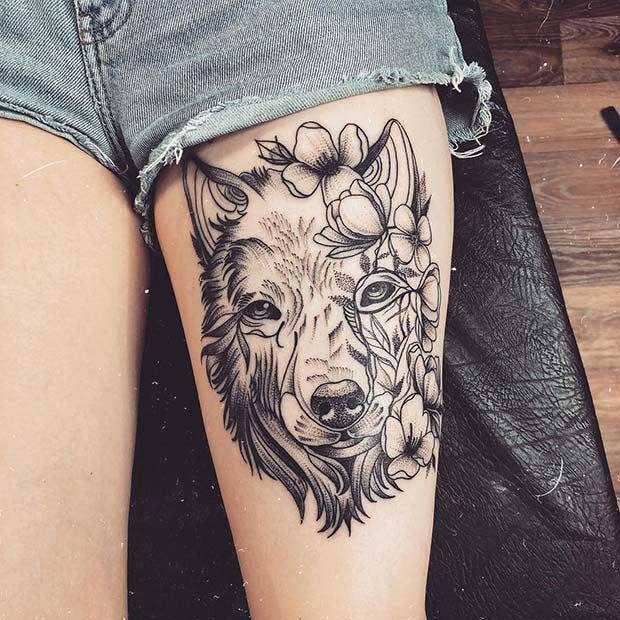 Tatouage de loup sur la cuisse